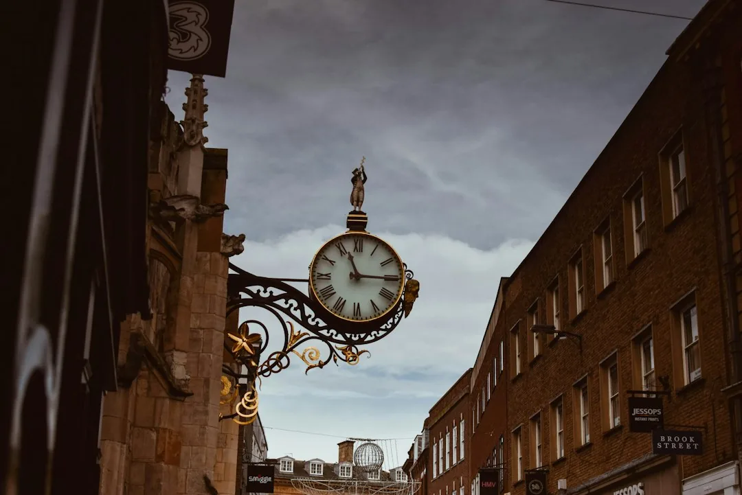 York — brown concrete building with analog clock