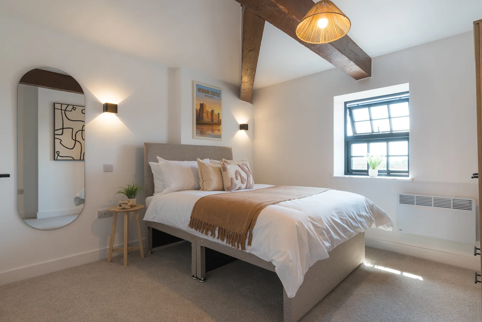 Bright bedroom at The Old Mill, a Renzo guest short-stay property in Newark